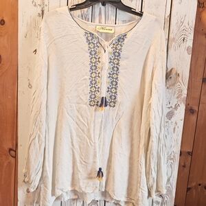 Elegant Women's Cream Top with Blue Accents
